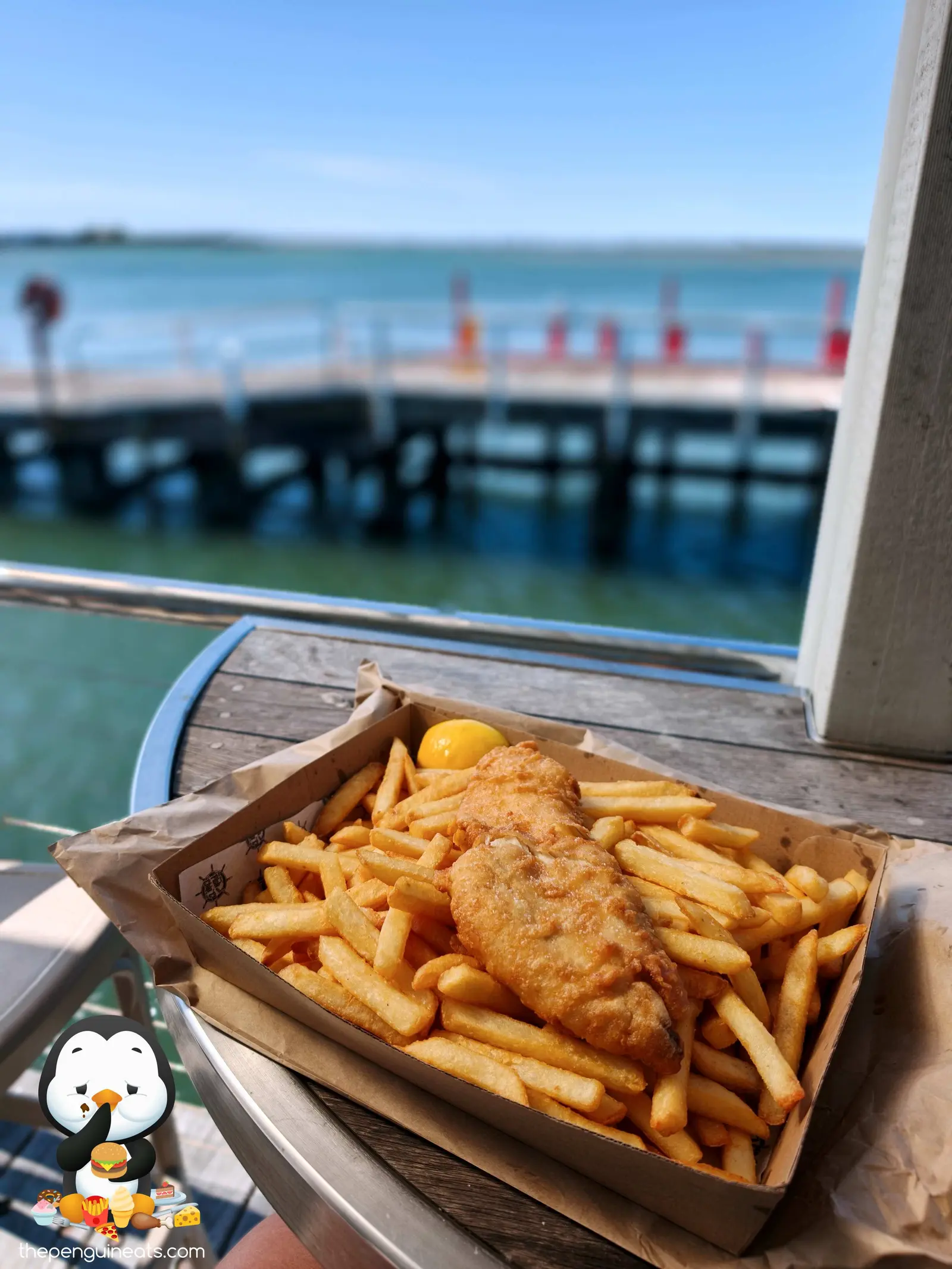 Featured dish and dining atmosphere at Port Albert Fish & Chip Co